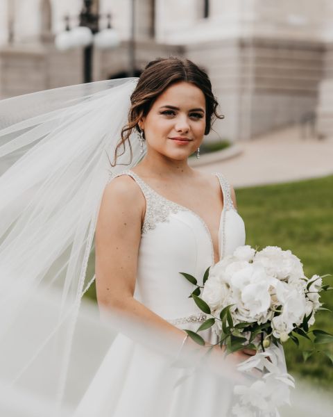 Bride with updo hairstyle and a veil